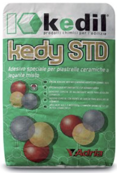 Immagine descrittiva del prodotto KEDY STD - Adesivo cementizio a legante misto ad uso professionale, per la posa di grès porcellanato, di ceramiche di qualsiasi tipo purchè stabili all'umidità Immagine descrittiva del prodotto KEDY STD - Adesivo cementizio a legante misto ad uso professionale, per la posa di grès porcellanato, di ceramiche di qualsiasi tipo purchè stabili all'umidità